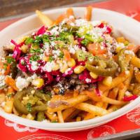 Turkish Street Fries · French Fries topped with Our DonerG House Sauce, Grilled Onions, Beef Doner Kebab, More Hous...