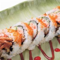 Spider Roll · Deep fried soft shell crab, crab meat, avocado with eel sauce and crunch.