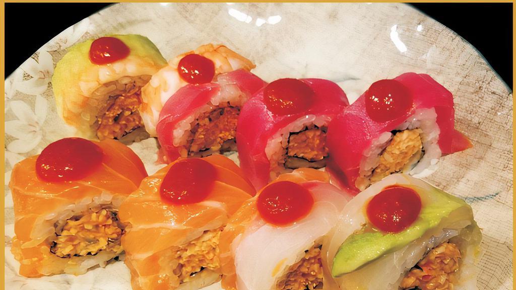 Spicy Rainbow Roll · Spicy. Crab, chopped jalapeño, sriracha with fresh fish on top with house sauce.