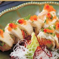 Snow Roll · Spicy. Baked crab, avocado, cream cheese and white fish topped with masago and green onion.