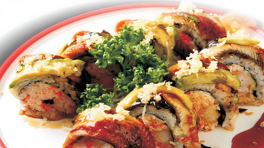 American Roll · Shrimp tempura, crab meat with eel and avocado on top.
