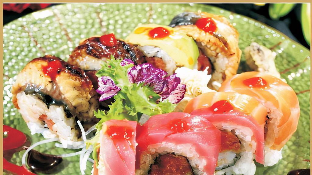 Crazy Spicy Roll · Shrimp tempura. Spicy tuna topped with salmon, eel, white tuna and special hot spicy house sauce.