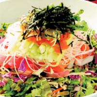Sashimi Donburi · Spring mix, radish, cucumber, masago chef choice fish on rice.