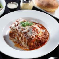 Meat Lasagna · Layers of  ground beef, Italian sausage  ricotta cheese and pasta baked in meat sauce, toppe...