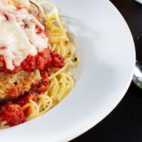 Chicken Parmesan · Lightly breaded chicken breast baked in marinara sauce topped with mozzarella cheese, served...