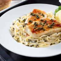 Chicken Piccata · Chicken breast with a white wine sauce, splash of lemon & capers served over angel hair pasta