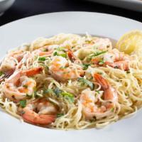 Shrimp Scampi · Savory shrimp with our signature scampi sauce served over Linguini pasta