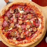 Meat Lovers · Meatballs, pepperoni, ham, sausage, salami, fresh garlic.