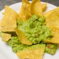 Guacamole Dip A La Mixteca · Our signature homemade guacamole made with fresh onions and tomatoes.
