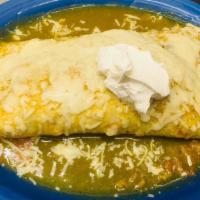 Burrito Supreme · Our signature wet burrito filled with chicken, beef, pork, or chile relleno, rice, and beans...