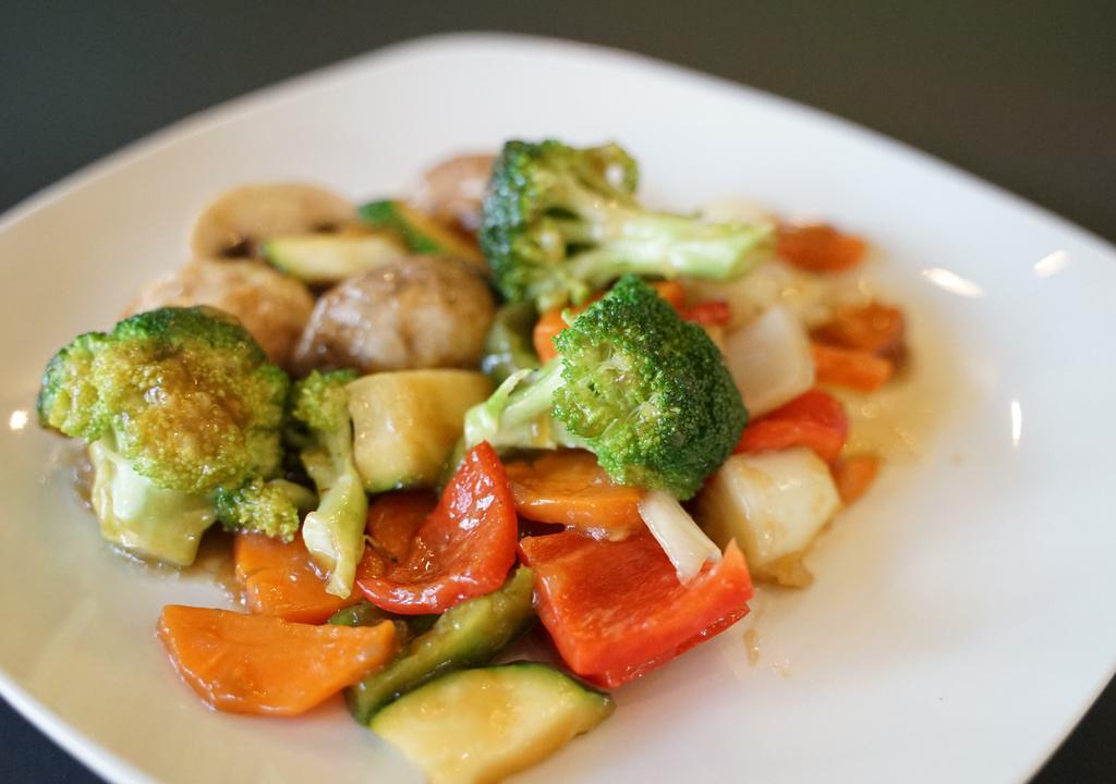 Veggie Fried Rice · Broccoli, carrots, mushroom, zucchini, bell peppers, onion.