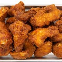 Naked Wings · Our take on classic fried chicken battered in a thin crispy layer and seasoned with a simple...