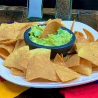 Guacamole Dip & Chips · Fresh guacamole and corn tortilla chips.