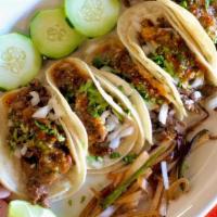 5 Mini Tacos · Choose between asada, pastor, carnitas, grilled chicken, shredded beef or chicken. Onion, ci...