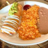 Chimichanga · Choice of shredded chicken, shredded beef or asada. Rice, beans, sour cream and cheese insid...