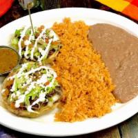 2 Sopes Tapatios · Choice of shredded chicken or beef, asada or carnitas. Crispy sopes topped with a thin layer...