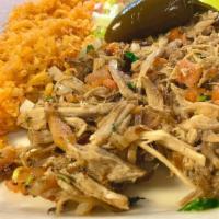 Carnitas Plate · Shredded pork carnitas mixed with pico de gallo. Served with rice, beans and choice of torti...