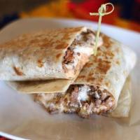 Asada Burrito · Carne asada with rice, beans, sour cream and cheese inside lunch style burrito.
