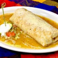 Chile Verde Burrito · Tender pork chile verde with rice, beans, sour cream and cheese inside lunch style burrito.
