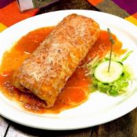 Chile Colorado Burrito · Tender pork spicy chile colorado meat with rice, beans, sour cream and cheese inside lunch s...