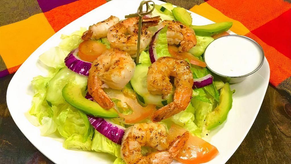 Shrimp Salad · Grilled Shrimp salad includes tomato, onions, cucumber and avocado. ranch or cilantro dressing available.