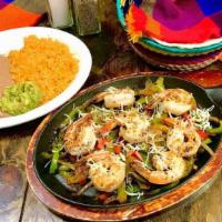 Shrimp Fajitas · Grilled shrimp in a mix of grilled onions, bell peppers and shredded cheese. Served with ric...