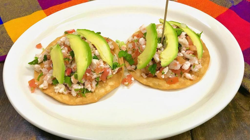 2 Ceviche Tostadas · Lime marinated shrimp in a mix with pico de gallo and fresh avocado slices on top.