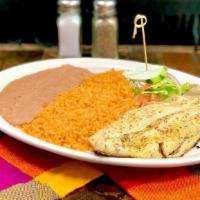 Fish Filet · Seasoned Fish Filet. Plate includes rice, beans and choice of tortillas.