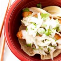 Fish Tacos (2) · Popular Item. 2 of our fried beer battered salmon tacos with onions and cilantro. Wrapped wi...