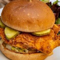 Fried Chicken Sandwich · Pickles, savoy cabbage slaw, hot sauce