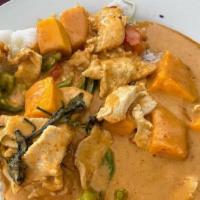 Mango Curry (Over Rice) · Panang curry with mango, bell peppers, and fresh basil.
