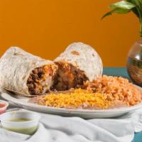 #24. California Combination · California Burrito W/Asada, Mexican Salsa, Potatoes & Cheddar Cheese.
**Substitutions: Carni...