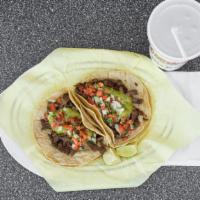 #8. Two Asada Tacos · **Choices: Carne Asada, Chicken, Carnitas W/Guacamole & Mexican Salsa.
**Al Pastor W/Guacamo...