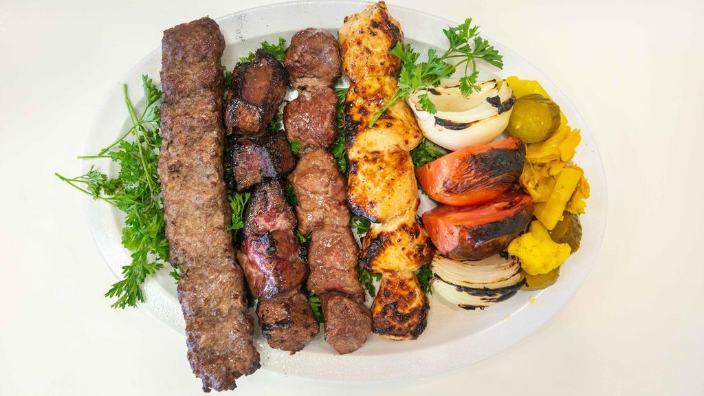 Mixed Grilled Plate · Beef kabab, beef tenderloin tikka, chicken tikka, beef liver.
