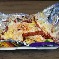 Takis Or Tostitos With Esquites · Takis Bag filled with Corn, Lime, Butter, Mayonnaise, Cheese and Chili Powder.