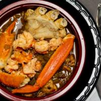File' Gumbo · Prepared with shrimp, chicken, hot Louisiana turkey sausage and crab with a rich blend of Ca...
