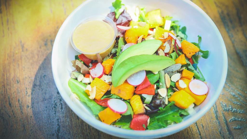 The Soul Bowl · Ancient grains, organic greens, roasted butternut squash, avocado, radish, roasted piquillos, toasty almonds and antioxidant-rich capsaicin-miso vinaigrette.