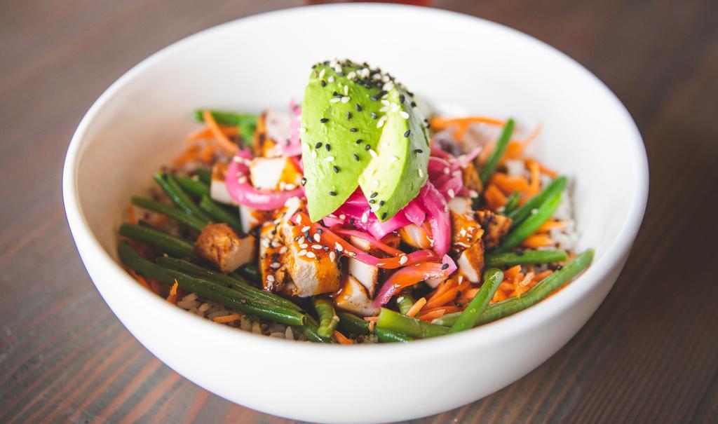 Korean Bbq Rice Bowl · Avocado, pickled onion, quinoa rice, sautéed green beans, carrots, spicy Korean BBQ sauce, cilantro oil, sesame seeds.