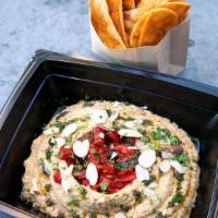 Mediterranean Hummus · Vegan spicy chickpea sun-dried tomato hummus, roasted red peppers, cilantro, toasted almonds...