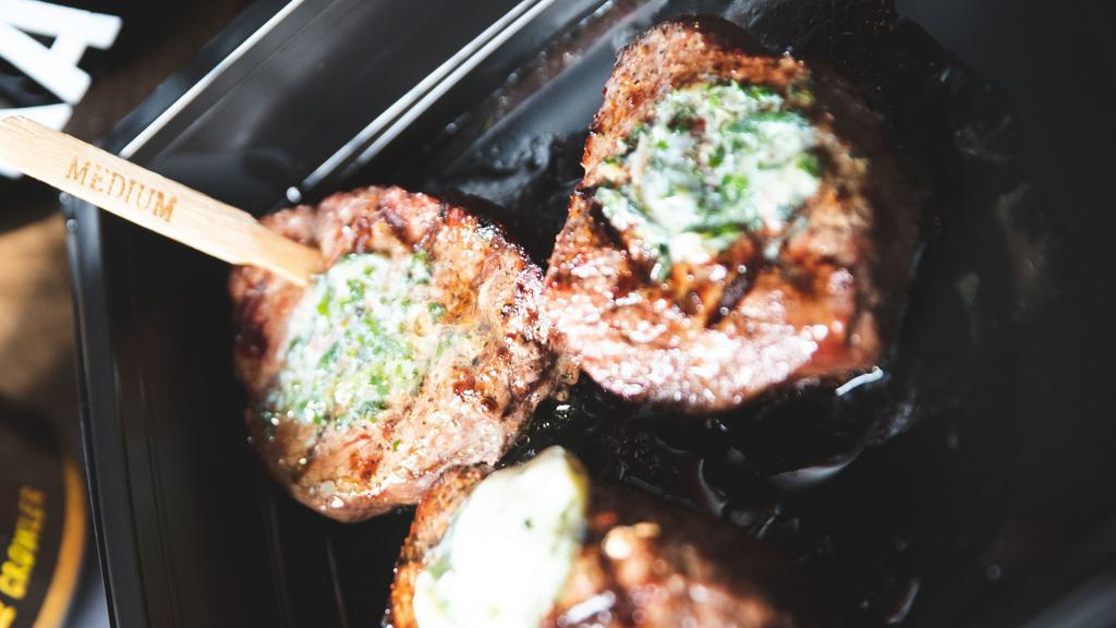 Ribeye Steaks · 12oz. portions, topped with herb butter– # of steaks