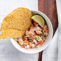 Tostada Ceviche De Camaron · Marinated shrimp.