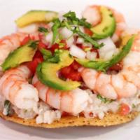 Tostada De Ceviche De Pescado Con Camaron · Marinated fish and shrimp.
