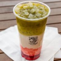 Matcha Love · Non-Dairy Ice milk infused with Strawberry puree and topped with  premium matcha.