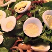 Spinach Salad · Baby spinach, mushrooms, red onion, bacon, hard
boiled egg with warm bacon vinaigrette dress...