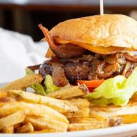 Whiskey Burger · Ground chuck, BBQ sauce, provolone cheese , bacon,
caramelized onions, roasted garlic aioli,...