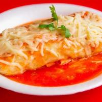 Burrito Mojado · Rice, beans, cilantro, onion, and choice of meat on a flour tortilla, bathed in mild red sau...
