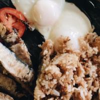 Tapa Silog · Marinated beef. Served with fried rice, egg, and tomato.