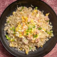 Crab Fried Rice · Stir fried rice with crab, onions,  green onions and egg.