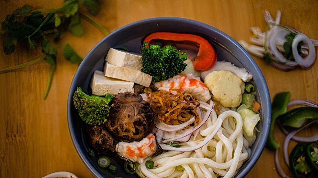 Love Of Life Soup · Japanese Udon Noodles w/ Soy Shrimp, Tofu, Shiitake Mushrooms, Seasonal Mixed Vegetables,  Sesame Soy Vegetable Broth topped w/ Caramelized Onions, Onions, Cilantro WHEAT FREE OPTION – VEGAN