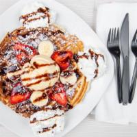 Super Waffle · 1scoop of vanilla ice cream, strawberries, bananas,  whipped cream, Hershey's chocolate and ...